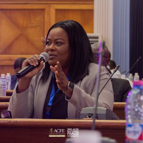 A delegate asking a question from the floor in 2025