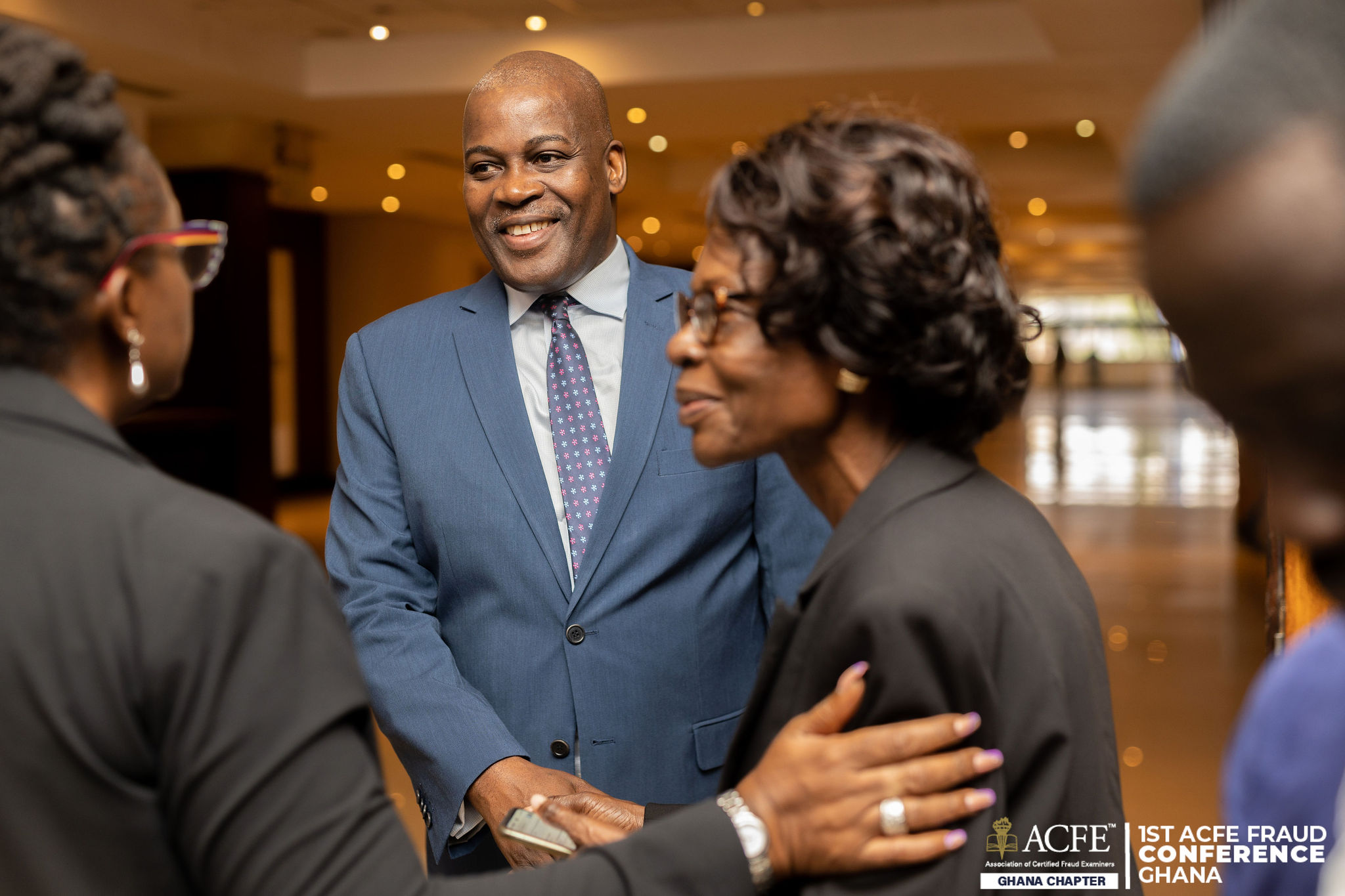 ACFE Ghana delegates talking together at the 2023 conference